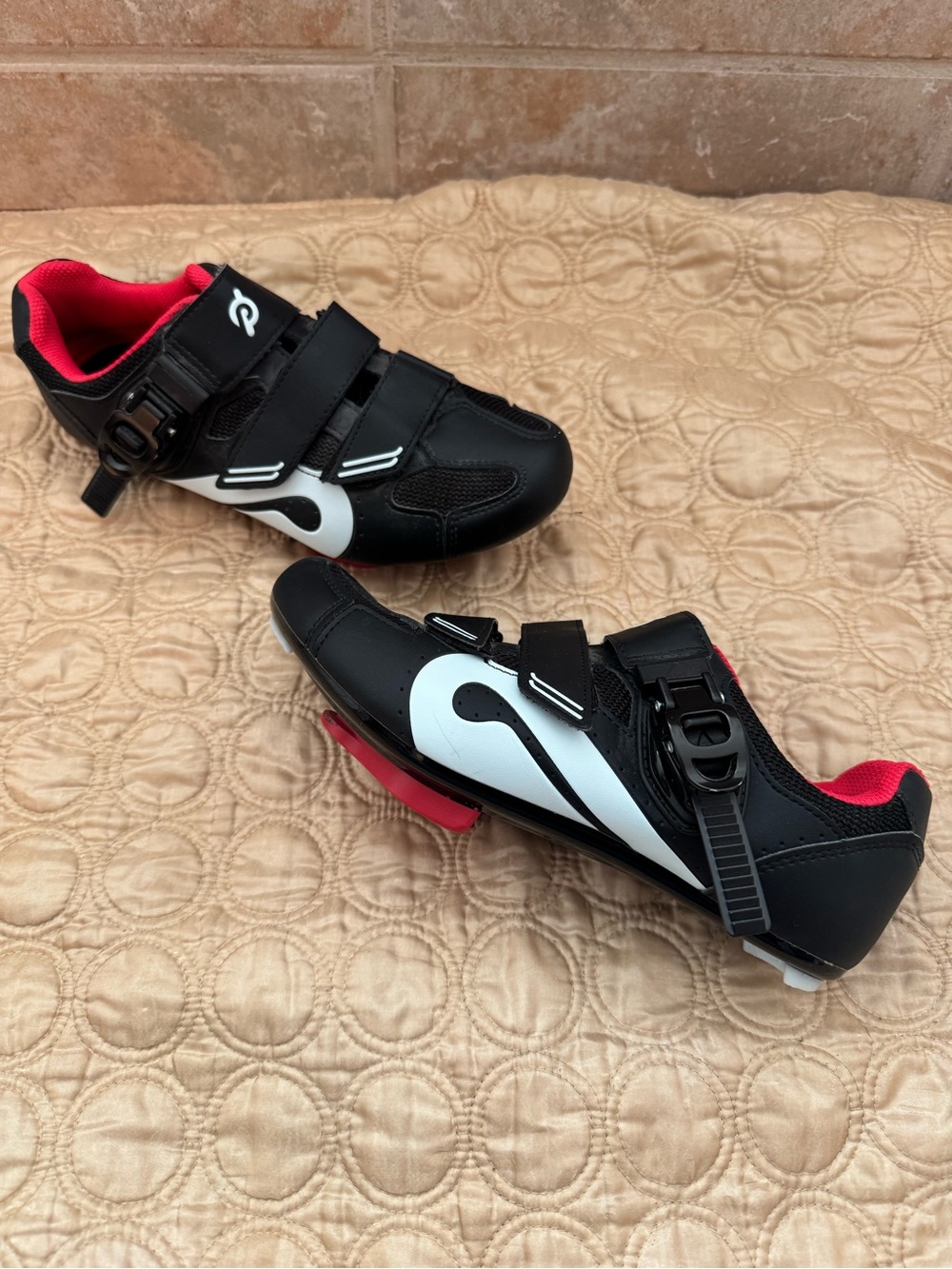 Peloton Black Cycling Shoes with White Swoosh and Pink Lining
